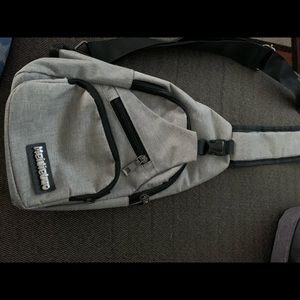 Crossbody small backpack.